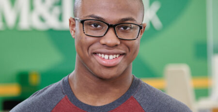 Young man smiling at M&T Bank