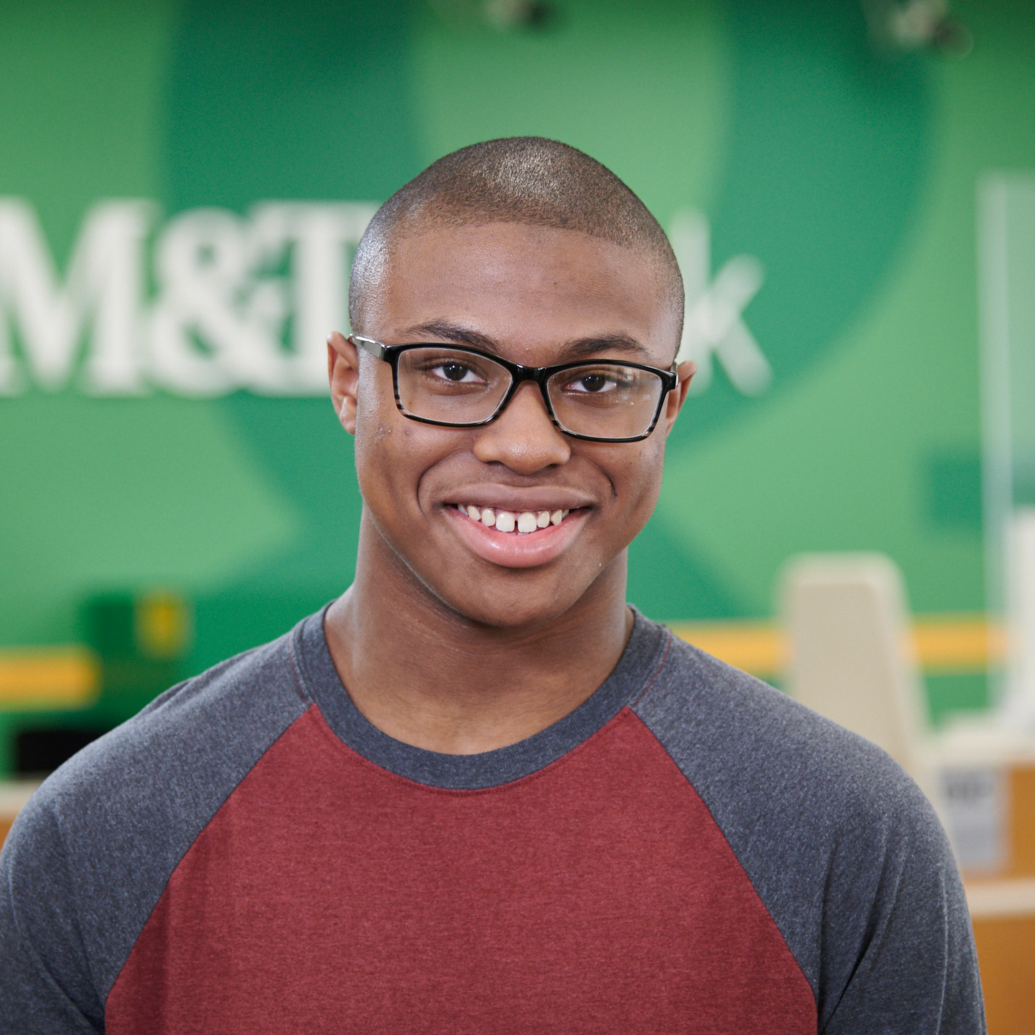 Young man smiling at M&T Bank